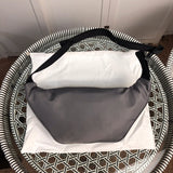 Handle and strap detail of polished everyday-luxe women's handbag – women's everyday handbag
