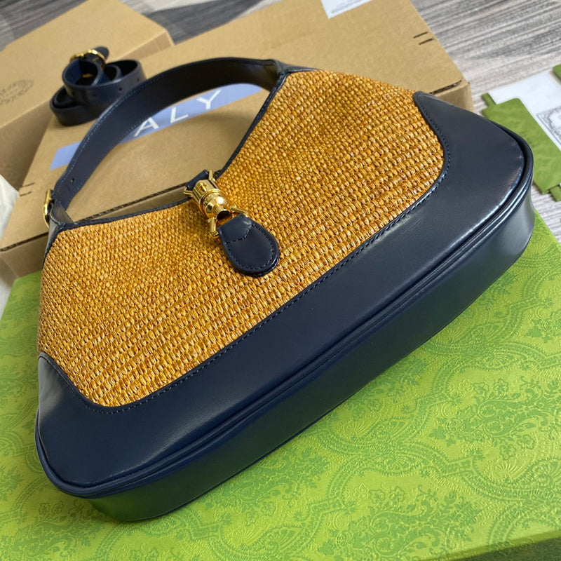 Styled lifestyle shot of statement elevated women's handbag – women's luxury accessory