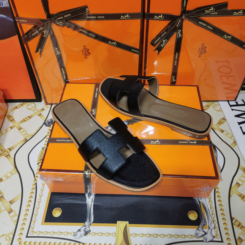 Hermès Grey Gladiator Sandals - Lifestyle Styling Shot