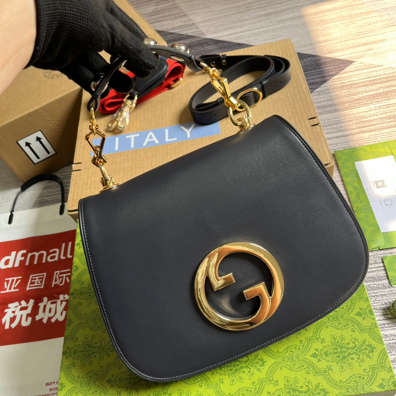 Back view of signature polished women's handbag – women's luxury handbag
