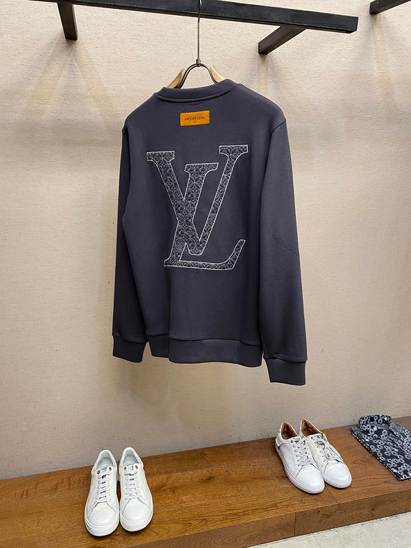 Side profile of Louis Vuitton luxury clothing with runway-inspired design