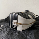 Side profile of signature everyday-luxe women's handbag – women's designer-style accessory