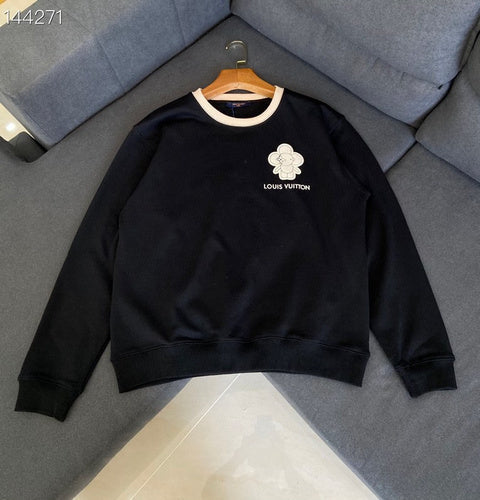 Full styled look of Louis Vuitton luxury clothing with everyday silhouette