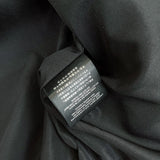 Front view of Gucci luxury clothing with logo-detail design