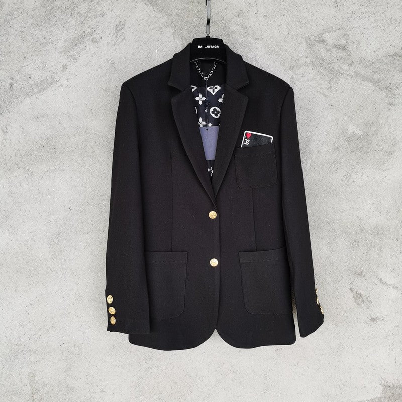 Back view of Louis Vuitton luxury clothing with logo-detail design