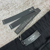 Front view of Amiri luxury piece style No.077