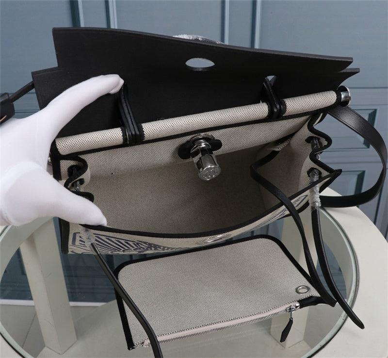 Side view of minimalist structured handbag