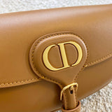 Styled lifestyle shot of premium sleek women's handbag – women's luxury accessory