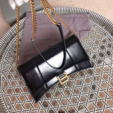 Close-up detail of signature elevated women's handbag – women's designer-style accessory