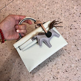 Polished bag shown from front angle