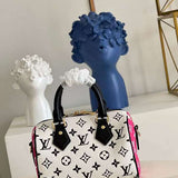 Back view of premium everyday-luxe women's handbag – women's statement bag