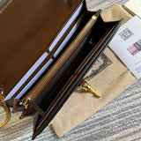 Side profile of polished signature women's handbag – women's statement bag