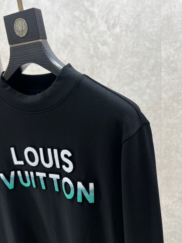 Full styled look of Louis Vuitton luxury clothing with monogram-inspired silhouette