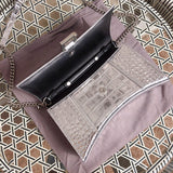 Top view of chic modern women's handbag – women's luxury accessory
