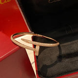 Side view of Cartier unisex jewelry piece