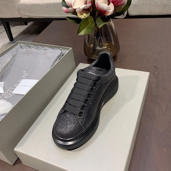 Alexander McQueen Fashion sneakers in stone beige premium leather build front view