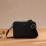 Side profile of signature statement women's handbag – women's premium purse