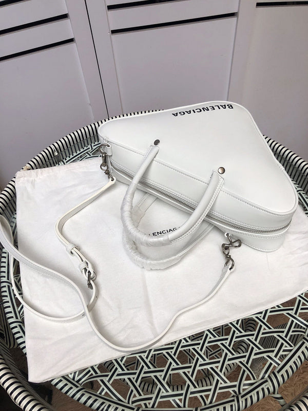 Styled lifestyle shot of chic polished women's handbag – women's designer-style accessory