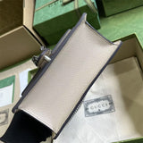 Side profile of chic modern women's handbag – women's statement bag