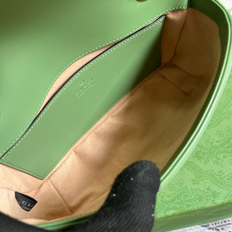 Side view of versatile structured handbag
