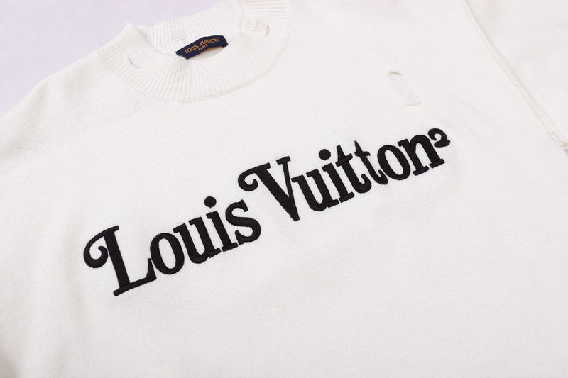 Back view of Louis Vuitton luxury clothing with label-forward styling