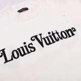 Back view of Louis Vuitton luxury clothing with label-forward styling