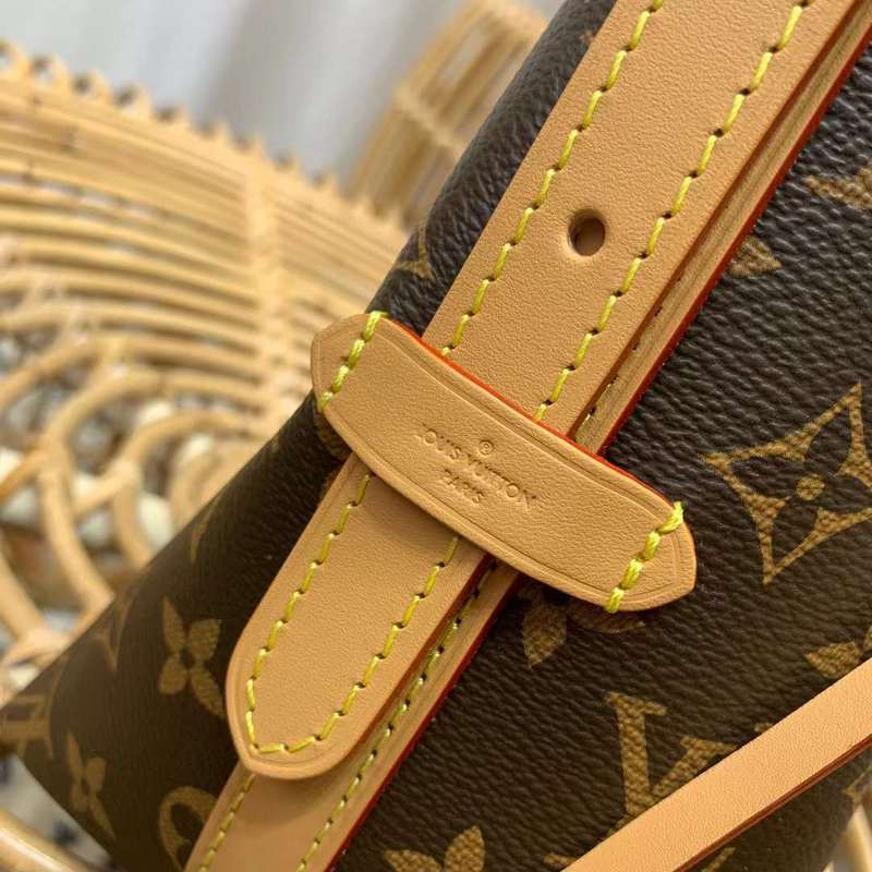 Handle and strap detail of statement classic women's handbag – women's luxury accessory