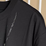 Flat lay presentation of Givenchy luxury clothing with logo-detail design