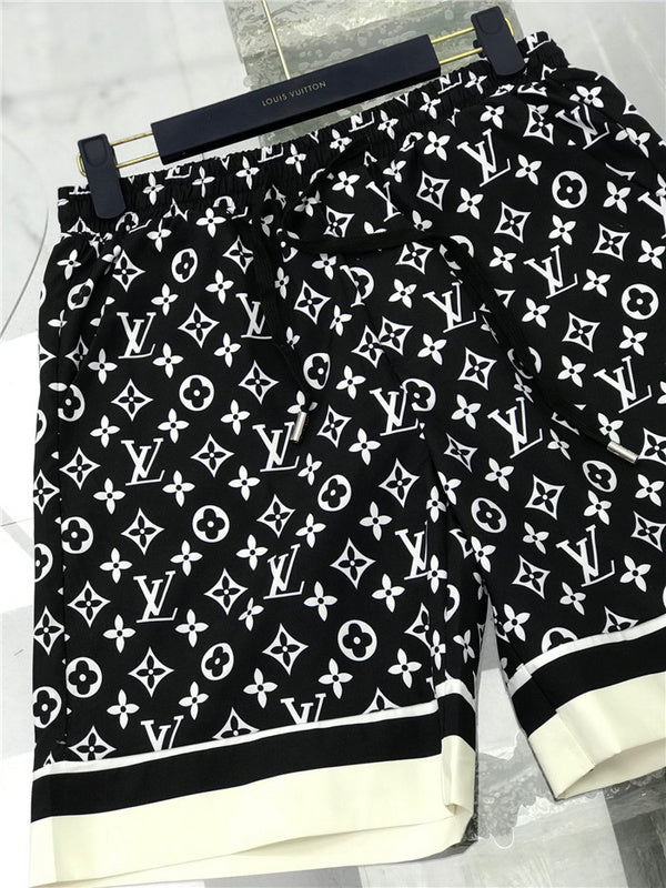 Close-up detail shot of Louis Vuitton cotton t-shirt with label-forward styling