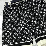 Close-up detail shot of Louis Vuitton cotton t-shirt with label-forward styling