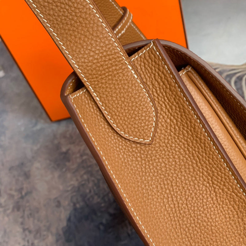 Side view of sleek structured handbag