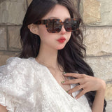 Front view of Louis Vuitton unisex sunglasses