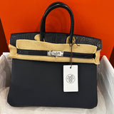 Close-up detail of statement bag design