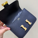 Side view of fluid structured handbag