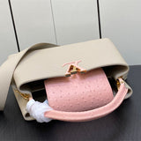  minimalist top-handle bag detail view showing craftsmanship