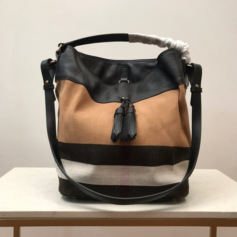 Ziva's Charm handbag – side angle view (one versatile size)
