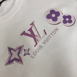 Close-up detail shot of Louis Vuitton luxury clothing with tailored silhouette