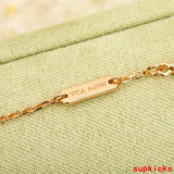 Full view of Van Cleef & Arpels unisex jewelry piece