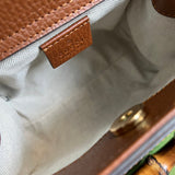 Close-up detail of refined classic women's handbag – women's designer-style accessory