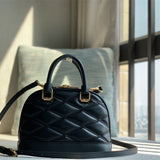 Sleek structured bag carried on shoulder