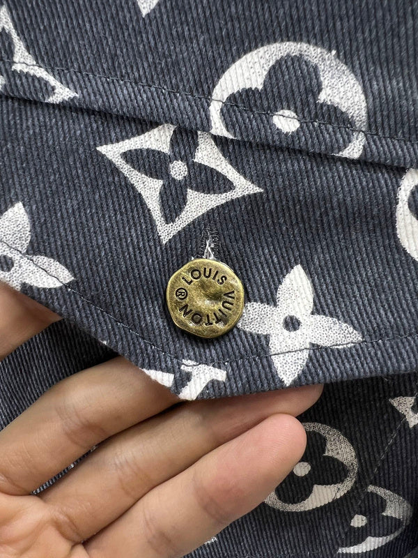 Flat lay presentation of Louis Vuitton luxury clothing with runway-inspired design