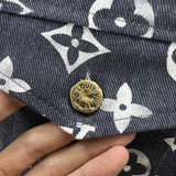 Flat lay presentation of Louis Vuitton luxury clothing with runway-inspired design