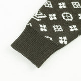 Flat lay presentation of Louis Vuitton luxury clothing with relaxed-fit cut