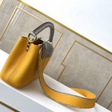 Close-up detail of signature classic women's handbag – women's statement bag
