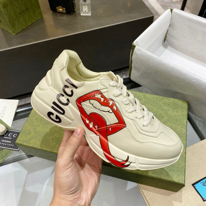 Gucci crisp white luxury sneakers view 10 retro runner design