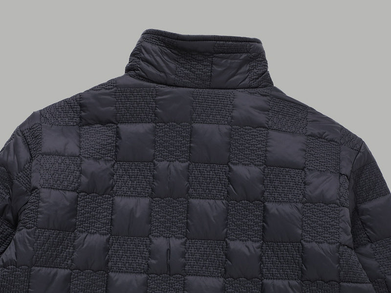 Close-up detail shot of Louis Vuitton luxury clothing with monogram-inspired silhouette