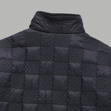 Close-up detail shot of Louis Vuitton luxury clothing with monogram-inspired silhouette