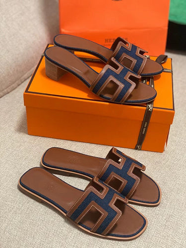 Hermès Beige Gladiator Sandals - Angled View