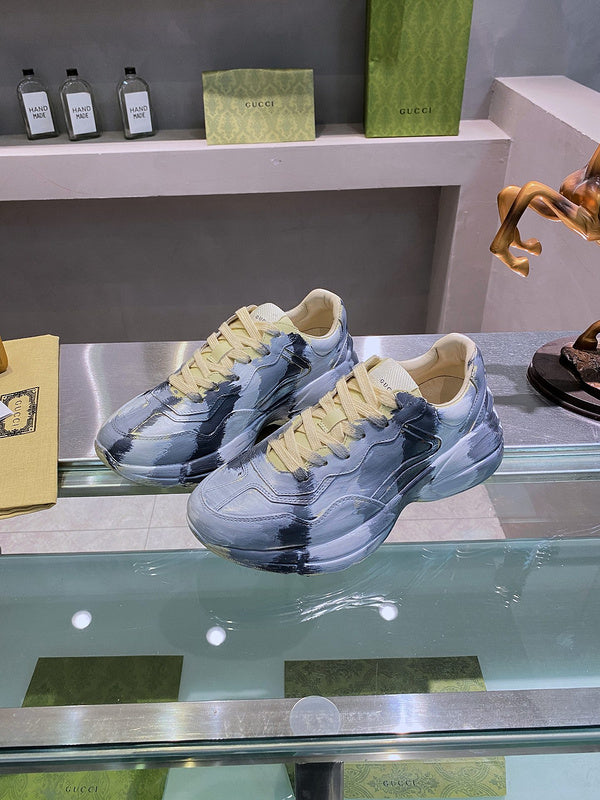 Gucci Fashion sneakers in soft grey bold athletic profile front view