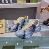 Gucci Fashion sneakers in soft grey bold athletic profile front view